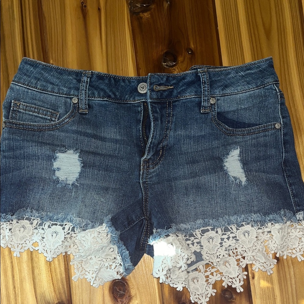 Altar'd State Distressed Blue Denim Shorts with White Lace Hem